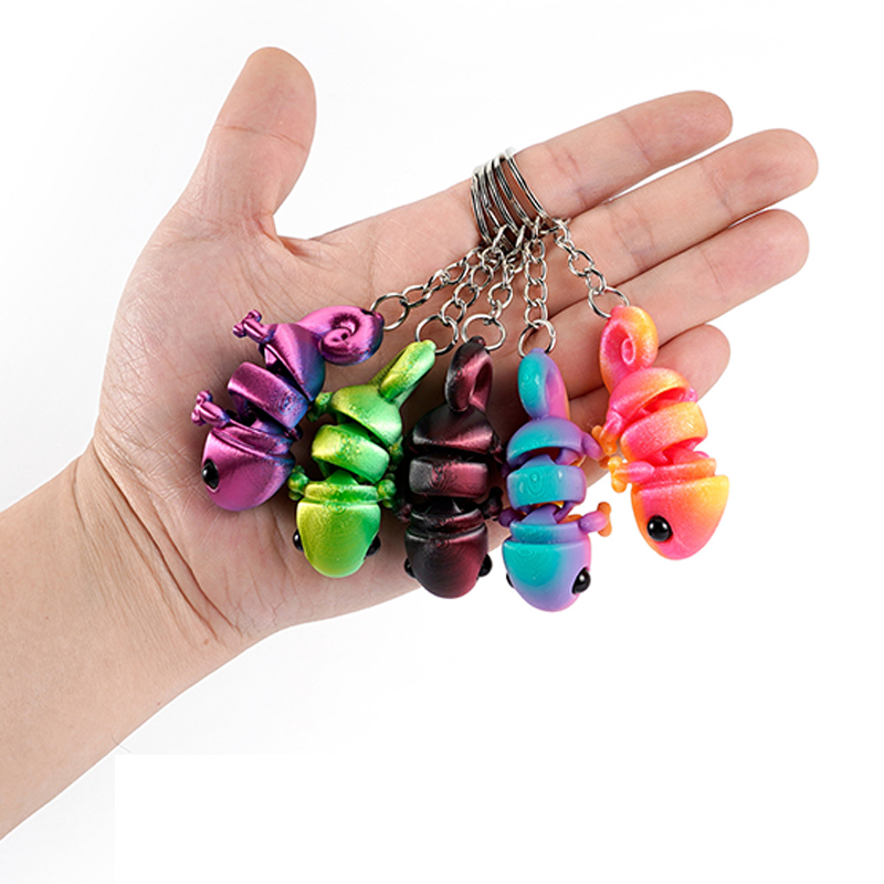 風変わりな 3D プリントカメレオンキーホルダー。可動関節の - Kids Quirky Toys のレビューと価格
